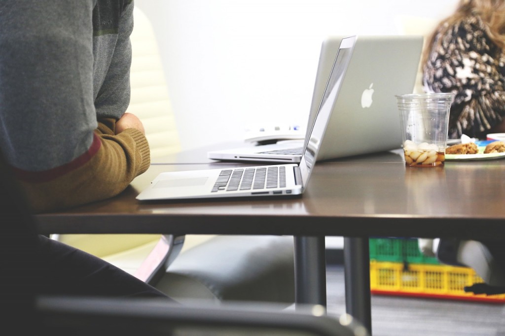 Working at desk with a laptop